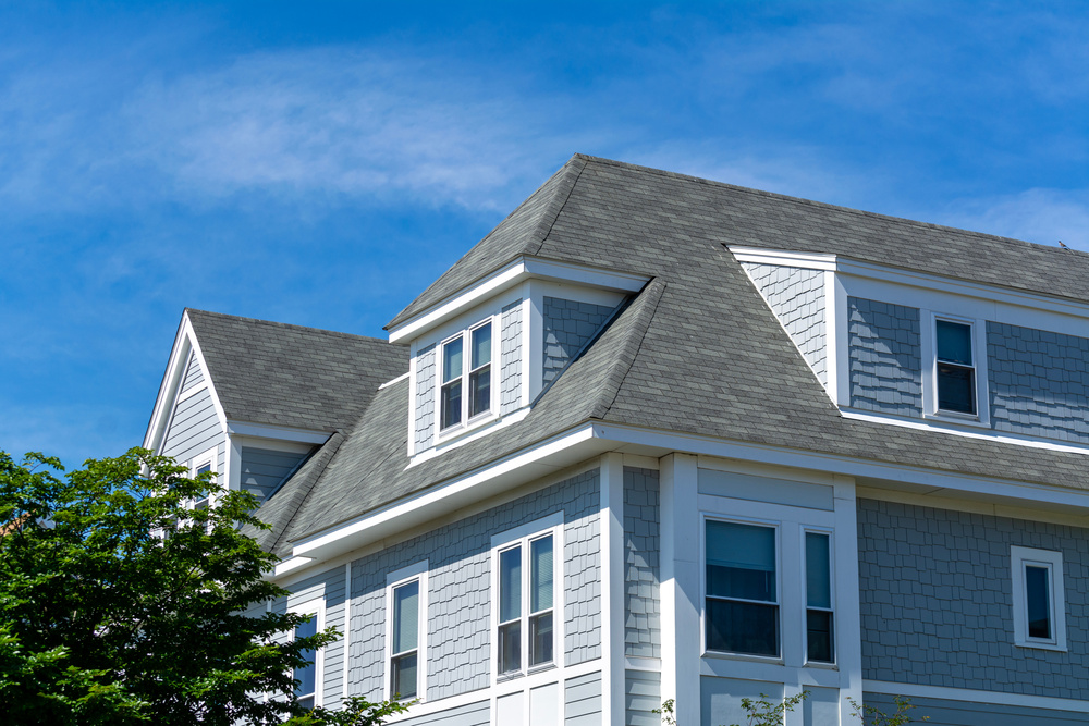 Residential home with shingle roofing